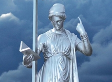 Standbeeld van persoon die een boek vasthoudt en naar de wolken wijst